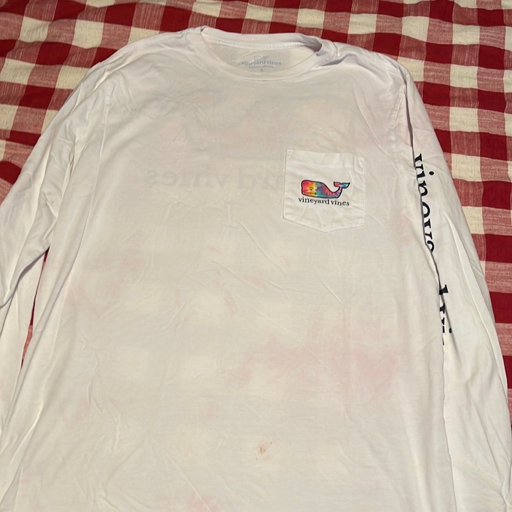 Size small 
White  logo design
No stains or issues